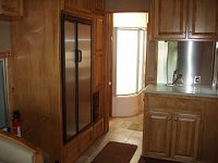 12 cu. ft. stainless fridge, sink w/covers & extendable faucet