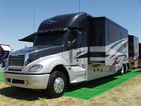 Front driver's side w/slide-outs & awning extended