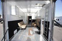 Inside garage w/steel cabinetry, roof hatch, bunks & E-track