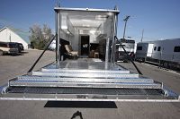 Rear showing garage space w/bunks & hydraulic loading ramp